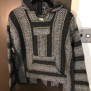 Green white gray and black sweater